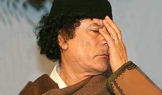 Каддафи обратился за помощью к Чавесу  