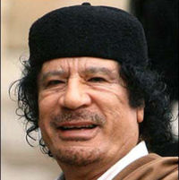 Лидеры США, Франции и Великобритании намерены добиваться отставки Каддафи  