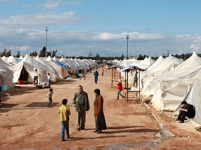 Турция запросит помощь ООН для приема беженцев из Сирии