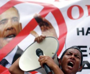 Мусульмане в Малайзии вышли на акцию протеста против визита Обамы