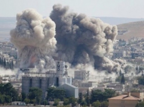Боевики ИГ взяли под контроль около половины города Кобани