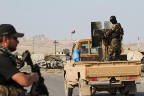 Бойцы курдских формирований из Ирака доставили защитникам Кобани первую партию оружия