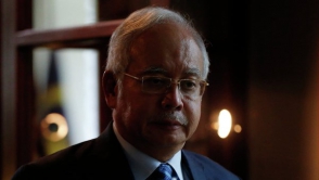 Մալազիայի վարչապետին քննադատել են ջրհեղեղի ժամանակ Օբամայի հետ գոլֆ խաղալու համար