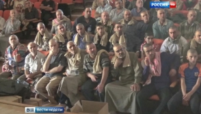 Боевики ИГ побрили христиан наголо и обложили золотым налогом (видео)