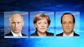 Путин провел телефонный разговор с Олландом и Меркель