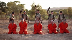 Террористы ИГ казнили пленных руками детей-иностранцев (фото, видео)