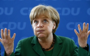 Партия Меркель заняла 3 место на региональных выборах в Германии