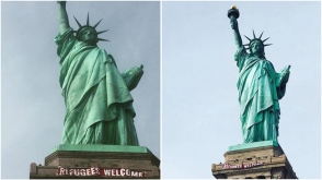 На статую Свободы повесили плакат «Беженцы, добро пожаловать» (фото)