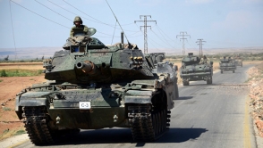 На севере Сирии идут бои между курдами и турецкой армией