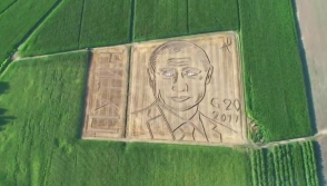 Перед саммитом G-20 на одном из итальянских пшеничных полей появился портрет Путина