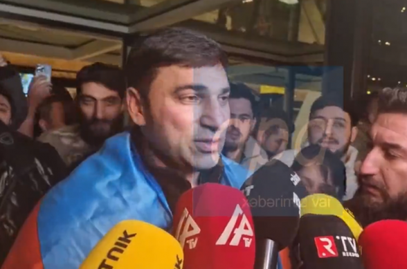 Убившего армянина азербайджанца торжественно встретили в Баку (видео)